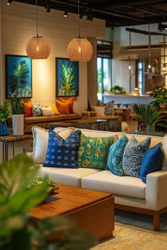 a living room filled with lots of furniture and plants