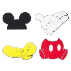 three mickey mouse stickers are shown in different colors and shapes, one is yellow, the other is red