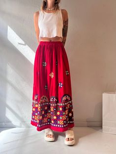 "- Vintage handmade red maxi skirt - Drawstring waist - Some discolouration in one spot - Feels like cotton - No tags - Small - large  Waist: 24\" - 32\"" Summer Full Length Cotton Skirt, Full Length Cotton Summer Skirt, Full Length Cotton Skirt For Summer, Cotton Maxi Length Skirt For Festivals, Summer Cotton Maxi Skirt Full Length, Red Maxi Length Bottoms For Spring, Traditional Red Bottoms For Spring, Traditional Red Bottoms For Summer, Red Cotton Maxi Skirt For Spring