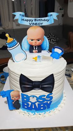 a baby shower cake for a boy on display