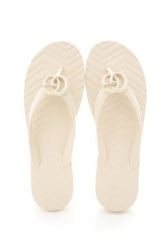 Gucci Ivory Rubber Logo Flip Flop Sandals. This item has never been .Size: 40 Brand = Gucci Shoe Size = 40 Color = Ivory Condition = Never Item Number: 27979-89 Item ID: 169731 Category: Sandals Luxury Modern Beach Flip Flops, White Textured Flip Flops, Gucci Slip-on Sandals, White Textured Slip-on Flip Flops, Luxury Gucci Slip-on Sandals, Gucci Shoe, Logo Flip Flops, Gucci Sandals, Gucci Shoes