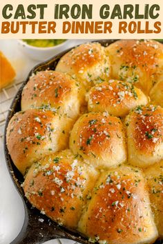 a cast iron garlic butter dinner rolls in a skillet with text overlay that reads cast iron garlic butter dinner rolls