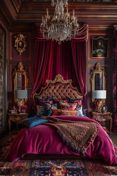 an ornate bedroom with red curtains, chandelier and pink bed linens on the floor