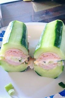 two cucumbers cut in half on a plate