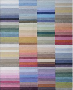 a multicolored rug with different stripes on it