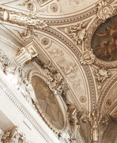 an ornately decorated ceiling in a building