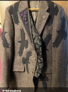 a jacket with birds on it and a tie