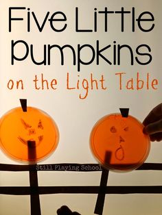 two pumpkins with faces drawn on them are shown in front of a sign that says five little pumpkins on the light table