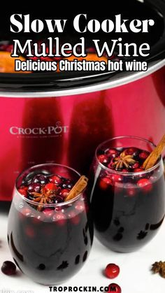 slow cooker filled with mulled wine next to crock pot and cinnamon sticks