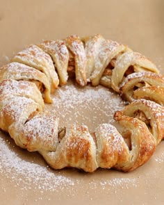 a pastry with powdered sugar around it