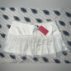 Brand New With Tags, Never Worn. White Ruffled Skort For Party, Flirty White Lined Skirt Bottoms, Flirty White Bottoms With Lace Trim, Flirty White Lined Skirt, Party Flared Skirt Bottoms With Lace Trim, Casual Party Bottoms With Lace Trim, Flirty Mini Skirt With Lace Trim, Fitted Flared Skirt With Lace Trim, Fitted Lace Trim Flared Skirt