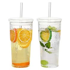 two glasses filled with different types of drinks