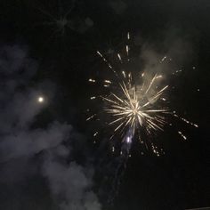 fireworks are lit up in the night sky