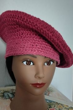 This is a handcrafted, round and flat-crowned hat to wear anyway you like. Pink One Size Fits Most Flat Cap, Handmade Adjustable Hat With Round Crown, Handmade Adjustable Round Crown Hat, Handmade Mini Hat With Curved Brim For Winter, Handmade Mini Winter Hat With Curved Brim, Handmade One Size Beret, Elegant Handmade Cap Style Hat, Elegant Handmade Cap Hat, Handmade Curved Brim Mini Hat, One Size