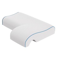 two white pillows with blue piping on the sides and one is made out of foam