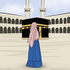 a woman standing in front of the ka'bah with her head bowed back