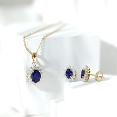 Product Details Crafted in solid gold, this Halo Pendant and Earring Set features an oval-cut lab-created blue sapphire, surrounded by a halo of moissanite, making it a timeless and elegant piece of jewelry that will make you stand out. Its classic design and high-quality materials ensure that this created blue sapphire jewelry set is a statement piece that you can cherish for years to come. Product Information SKU SHP-PENDANT012148435 Weight 4.54 gm (Approximate) LAB CREATED BLUE SAPPHIRE INFOR Fine Jewelry Gold Ring With Lab-created Sapphire, Gold Jewelry With Lab-created Sapphire For Anniversary, Sapphire Halo Design Jewelry With Lab-created Sapphire, Oval Tanzanite Jewelry With Halo Design, Sapphire Jewelry With Halo Design, Gold Jewelry With Lab-created Sapphire Birthstone, Gold Birthstone Jewelry With Lab-created Sapphire, 14k Gold Sapphire Jewelry With Halo Design, Fine Jewelry With Oval Lab-created Sapphire