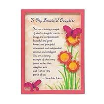 a pink frame with flowers and butterflies on the bottom, reads to my beautiful daughter