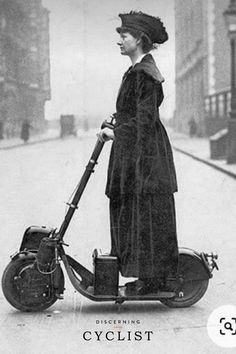 an old photo of a woman on a scooter