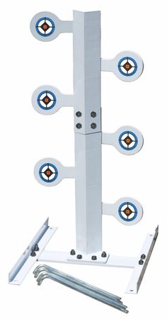 a white metal pole with four blue circles on the top and two holes in the middle