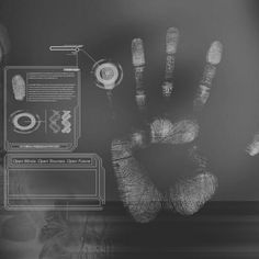 a person's hand is shown in front of a black and white background with information on it