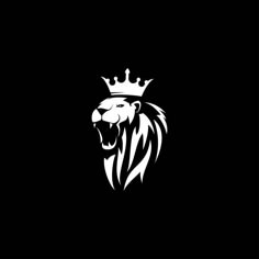 a black and white lion with a crown on it's head in the dark