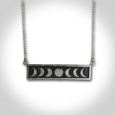 There is something so mystical and magical about the imagery of the phases of the moon. Perhaps it's the fact that the moon has impact on our ocean tides as well as life on this planet. Maybe its because no matter where we are on earth, we are all looking at the same moon. There's something really beautiful and comforting in that idea.OVERVIEW➸Each pendant is cast in solid sterling silver from an original hand fabricated model ➸Moon phase pendant measures approx.  2" x 3/8"➸Each pendant is uniqu Mystical Adjustable Moon Phase Jewelry, Adjustable Mystical Moon Phase Jewelry, Spiritual Crescent Moon Phase Necklaces, Spiritual Crescent Moon Phase Necklace, Adjustable Moon Phase Necklace, Adjustable Moon Phase Jewelry, Mystical Moon Phase Necklace, Mystical Moon Phase Jewelry, Black Symbolic Moon Phase Necklace