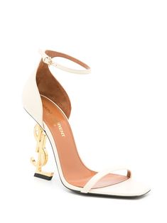 Find SAINT LAURENT Opyum 100mm Ysl Heel Sandals on Editorialist. real beige/gold leather square toe single toe strap branded insole buckle-fastening ankle strap 100mm signature YSL initials heel Ysl Heels White, Ysl White Heels, White Ysl Heels, White And Gold Heels, Dream Heels, Beige Sandals, Ysl Heels, Graduation Outfits, Nails Today