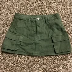 Shein Says Small But Would Fit Xs Size 2 Or 0. I Am A 4 And It Was Too Small For Me. Tight Cargo Skirt. Never Worn Cheap Fitted Brown Mini Skirt, Casual Green Cotton Cargo Skirt, Casual Mini Bottoms With Pockets, Casual Solid Mini Skirt With Pockets, Casual Stretch Mini Skirt With Pockets, Casual Mini Skort With Pockets, Casual Stretch Mini Bottoms, Green High Waist Casual Skort, Casual High Waist Skort For School