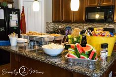 a kitchen counter topped with lots of food