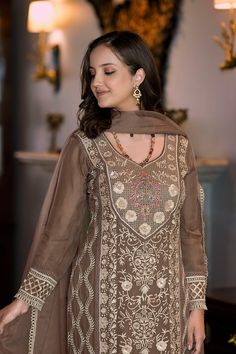 This Suit is a suitable amalgamation of style and grace that is required from ethnic wear. The dress is ideal for any formal or informal gathering. Crafted with the utmost care, our plazzo suits are made from high-quality fabrics that offer comfort and breathability, allowing you to move effortlessly. The highlight of our salwar suit, is meticulously designed to enhance your beauty. It comes in a range of stunning styles, catering to diverse occasions and preferences. Chest Size: Medium: 38 Inch Elegant Chikankari Embroidery Palazzo Set For Navratri, Festive Brown Chanderi Kurta, Festive Brown Salwar Kameez With Dupatta, Unstitched Suit For Diwali And Formal Occasions, Brown Anarkali Set With Dupatta For Festive Occasions, Festive Brown Anarkali Set With Dupatta, Brown Anarkali Set With Zari Work, Elegant Brown Dress With Dupatta, Traditional Unstitched Formal Sets