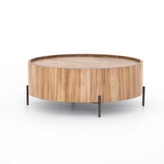 a wooden coffee table with metal legs and a round wood tray on the bottom that has been turned upside down