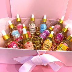 Get this beautiful pink magnetic-close, gift box set with our signature 12 scented body oils- This is a perfect holiday gift!  Get all of our amazing sweet scented body oils. This oil is fantastic! It smells so YUMMY, fruity, sweet and delicious! The oil does not leave a residue and the scents lasts long. The gift box is so pretty and comes with a bow. The box can be used for keepsakes, jewelry and more. It is a keeper! This includes: 12- 1 oz. glass dropper bottles. Scents included: Fruit Loops Grape Crush, Strawberry Birthday Cake, Body Glow, Body Butters Recipe, Strawberry Birthday, Glow Oil