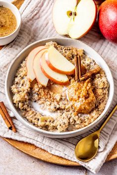 oatmeal with apples and cinnamon in a bowl