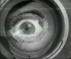 an eyeball is seen in this black and white photo from the 1950's