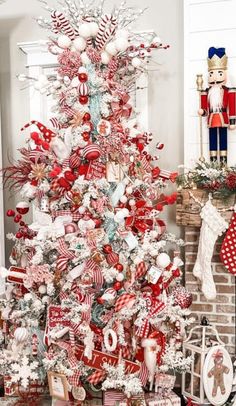 a christmas tree decorated with red and white ornaments