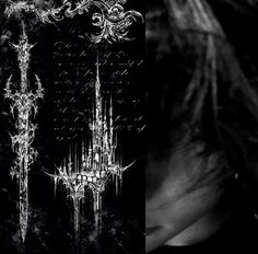 an artistic black and white photo of a gothic - style chandelier in the dark