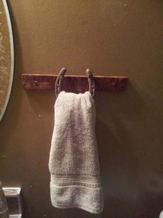 a towel hanging on a hook in a bathroom