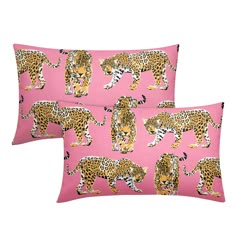 two pink pillows with leopards on them