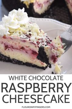 a white chocolate raspberry cheesecake on a plate with a fork in it