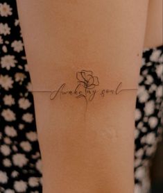 a woman's arm with the words awake my soul written in cursive writing