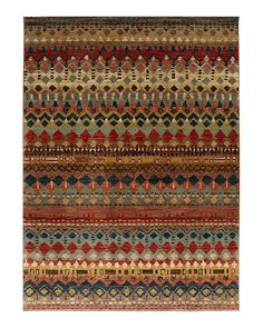 a multicolored rug with many different patterns