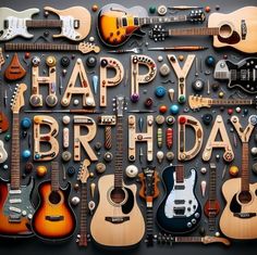 a birthday card with guitars and the words happy birthday written in large letters on it