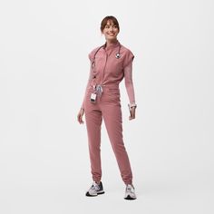 Official FIGS® Scrubs. Ridiculously Soft Scrubs Designed Just For You. Get Free Shipping On Orders $50+! | FIGS Womens Mauve Rafaela™ ScrubJumpsuit™ Figs Scrubs Outfit, Scrub Fits, Cargo Jumpsuit, Scrubs Outfit, Figs Scrubs, Nursing Shoes, Awareness Ribbon, Awareness Ribbons, Scrub Tops