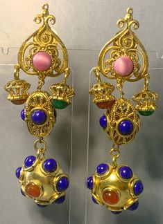 AMAZING DESIGNER ITALIAN Long Dangly Gold Clip On Earrings, Blue Cabochons Moghul Byzantine Greek etruscan Style, Runway Statement Couture. This is a SUPERB Pair of Long Dangly Designer Earrings! Fabulous in style, length and design! Set with Green, Pink Cobalt Blue and red Cabochons! A very unique pair of earrings in a true Etruscan Style! Intricate design at the top, followed by a matte Domed Charm set with Glass Cabochons, Elegance, History, Glamour in design coming all together in this true Gold Byzantine Dangle Earrings, Etruscan Jewelry Earrings, Luxury Byzantine Style Gemstone Earrings, Byzantine Yellow Gold Ceremonial Earrings, Yellow Gold Filigree Byzantine Earrings, Gold Clips, Charm Set, Antique Jewellery, Designer Earrings