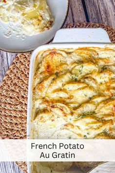 french potato au gratin in a white casserole dish