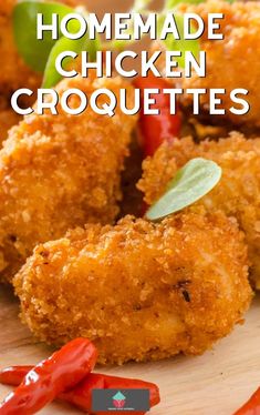 homemade chicken croquettes on a cutting board with peppers