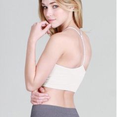 Nikibiki Skinny Y-Back Sports Bra - Stone Sporty Cami Crop Top With Built-in Bra, Sports Cami Crop Top With Built-in Bra, Sporty Camisole Sports Bra With Built-in Bra, Beige Stretch Sports Bra With Built-in Bra, Cami Sports Bra With Built-in Bra For Gym, Sporty Cami Crop Top With Seamless Construction, Sporty Seamless Cami Crop Top, White T-back Top With Built-in Bra, Sporty Medium Support Bra For Loungewear