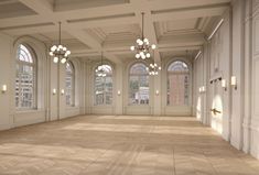 an empty room with several windows and chandeliers