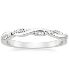 a white gold wedding band with diamonds